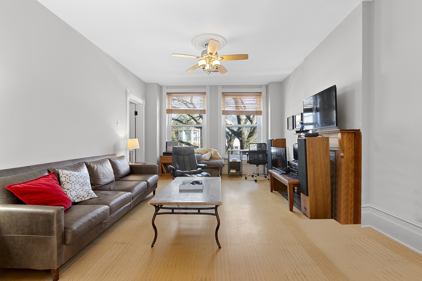 929 West Fletcher Street Chicago, IL 60657 - Photo 31 of 53 a living room with furniture a chandelier and a window