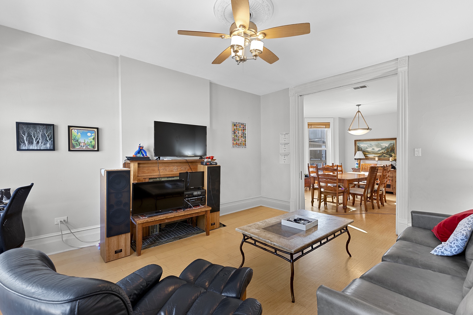 929 West Fletcher Street Chicago, IL 60657 - Photo 32 of 53 a living room with furniture and a flat screen tv