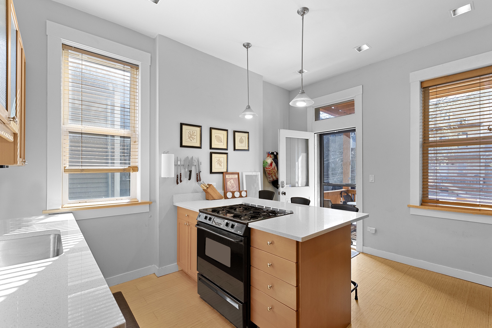 929 West Fletcher Street Chicago, IL 60657 - Photo 36 of 53 a kitchen that has a sink stove and cabinets