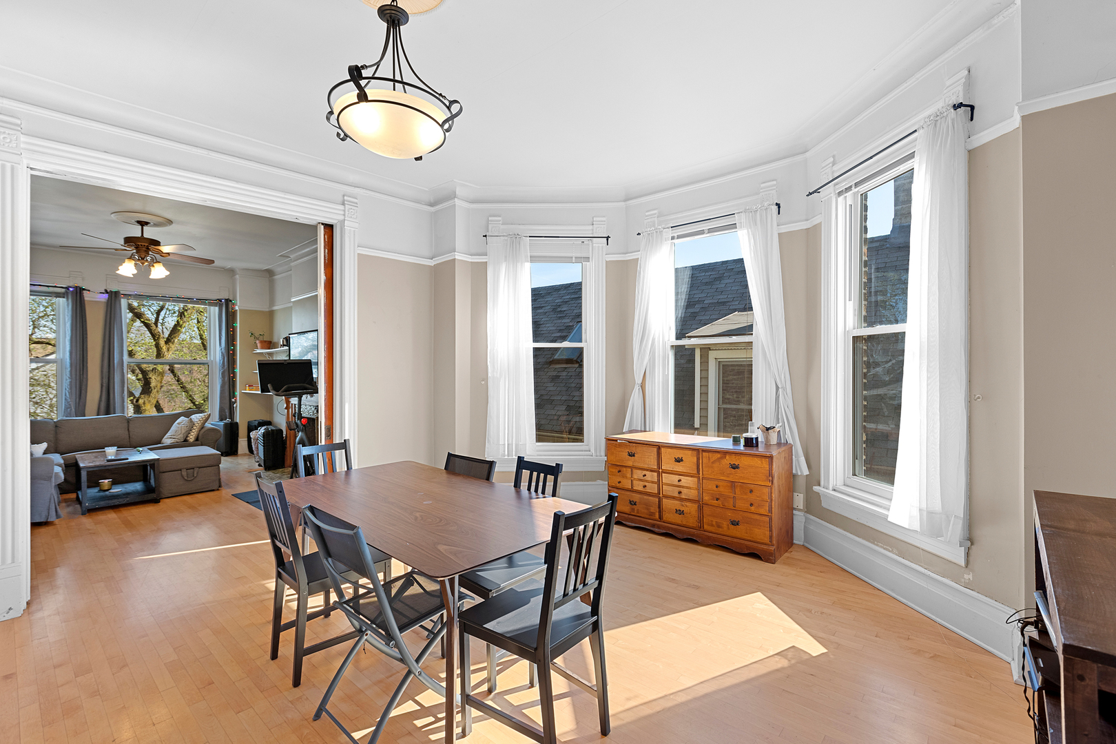 929 West Fletcher Street Chicago, IL 60657 - Photo 39 of 53 a view of a dining room with furniture and window