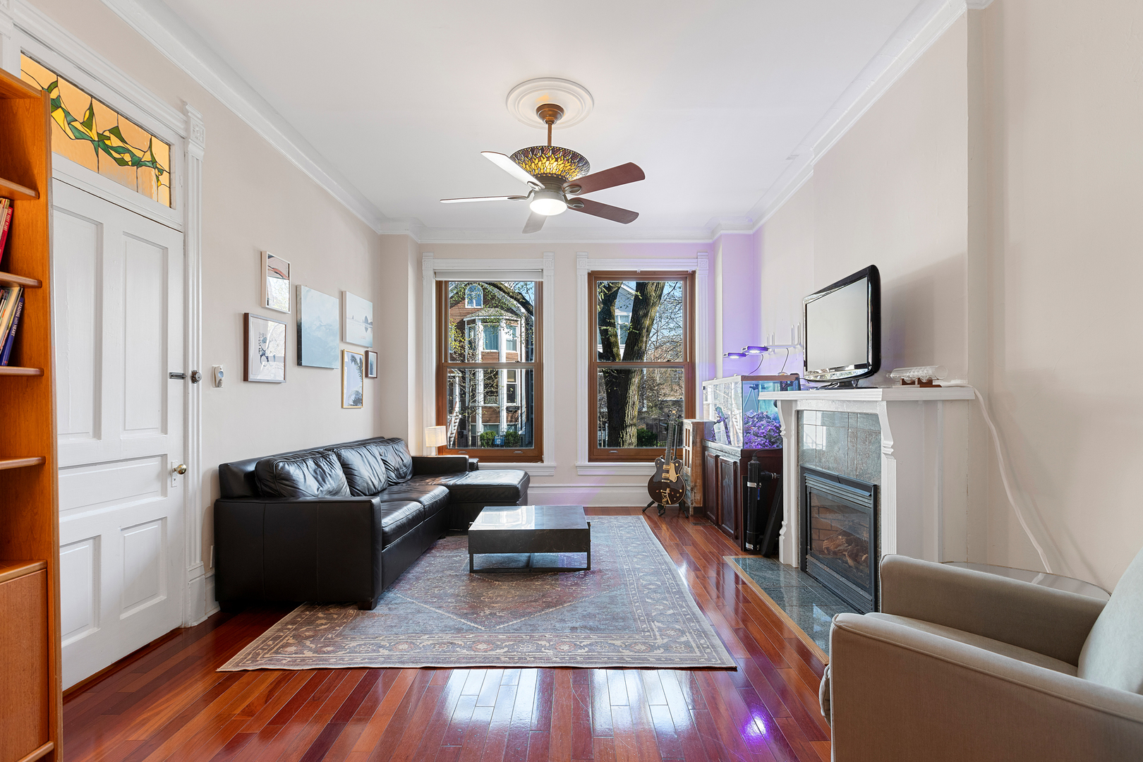 929 West Fletcher Street Chicago, IL 60657 - Photo 6 of 53 a living room with furniture and a fireplace