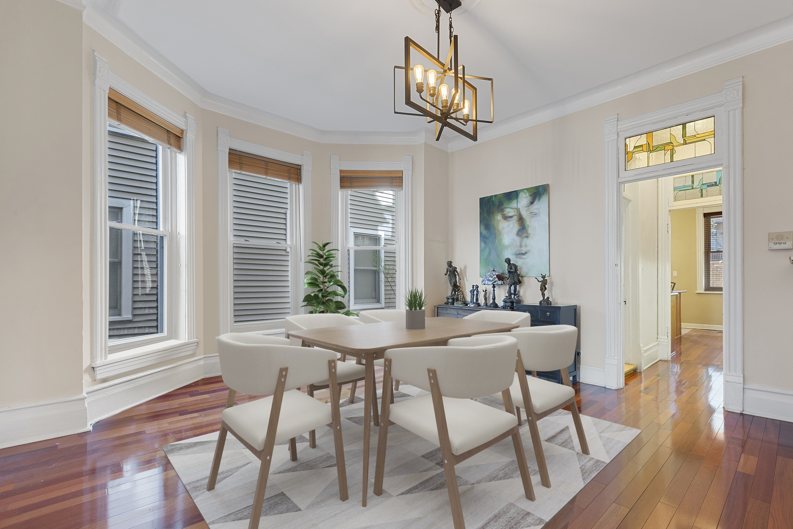 929 West Fletcher Street Chicago, IL 60657 - Photo 9 of 53 a view of a dining room with furniture wooden floor and chandelier