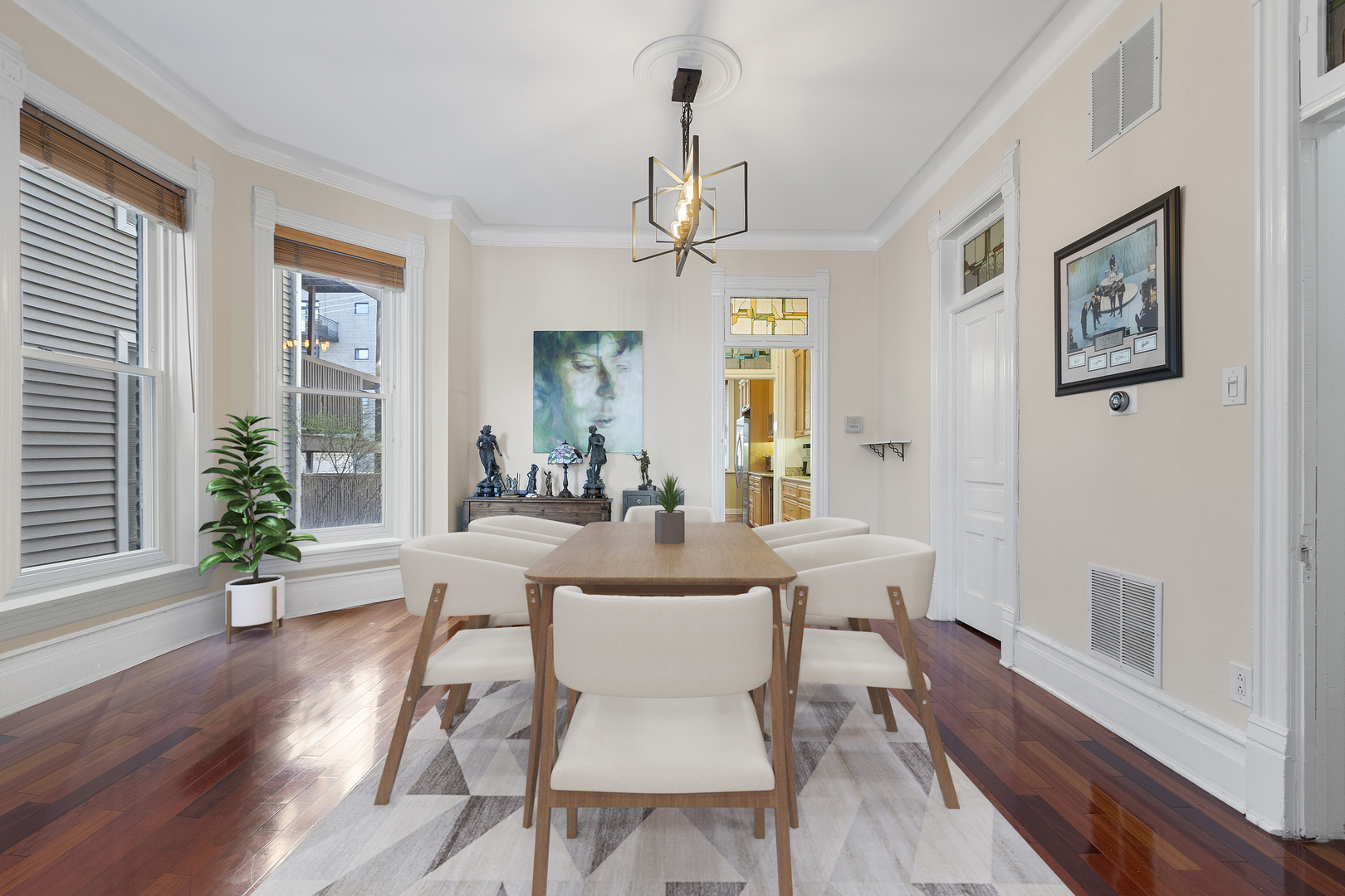 929 West Fletcher Street Chicago, IL 60657 - Photo 10 of 53 a view of a dining room with furniture window and wooden floor
