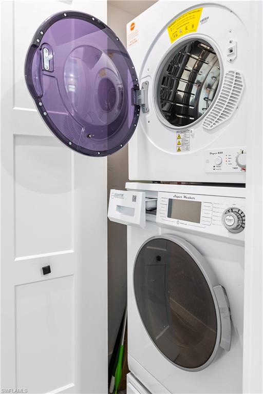 940 3rd Street South, Unit 204 Naples, FL 34102 - Photo 15 of 25 a utility room with dryer and washer