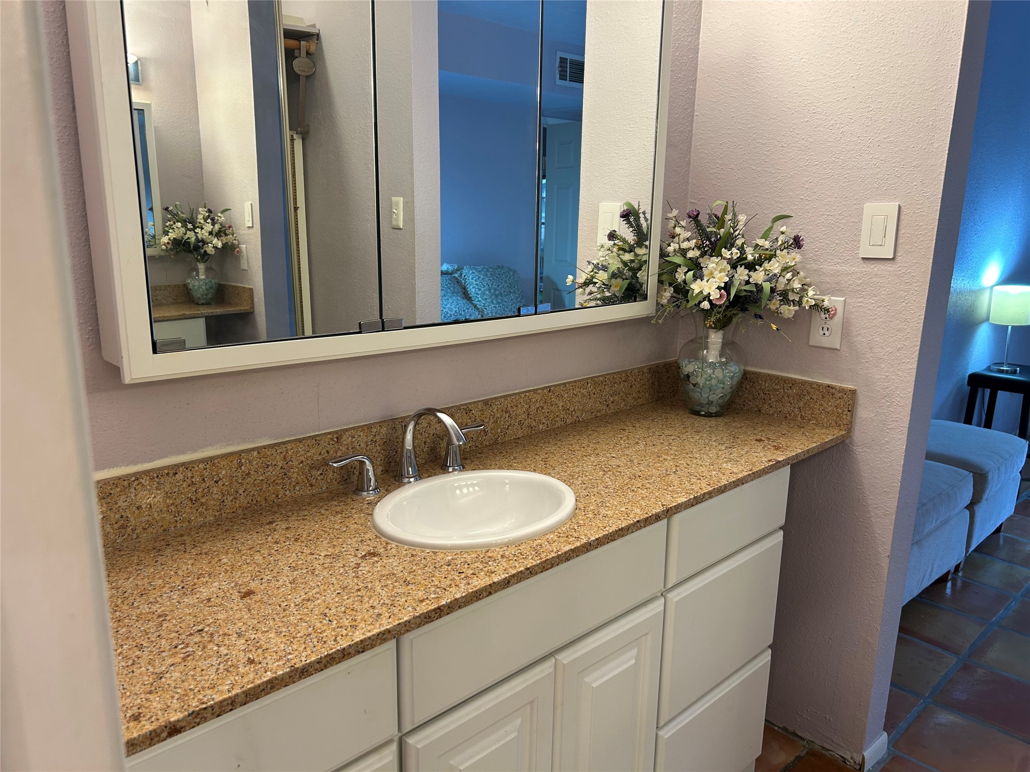 13034 Leader Street, Unit 965 Houston, TX 77072 - Photo 19 of 32 Split bath - large second vanity w granite counter and triple-door vanity mirror off main bedroom downstairs.