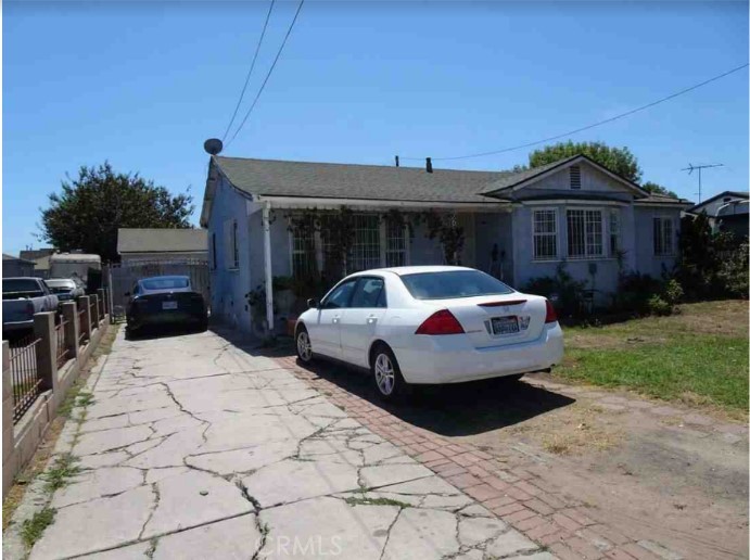 628 West Raymond Street Compton, CA 90220 - Photo 1 of 1 a car parked in front of house