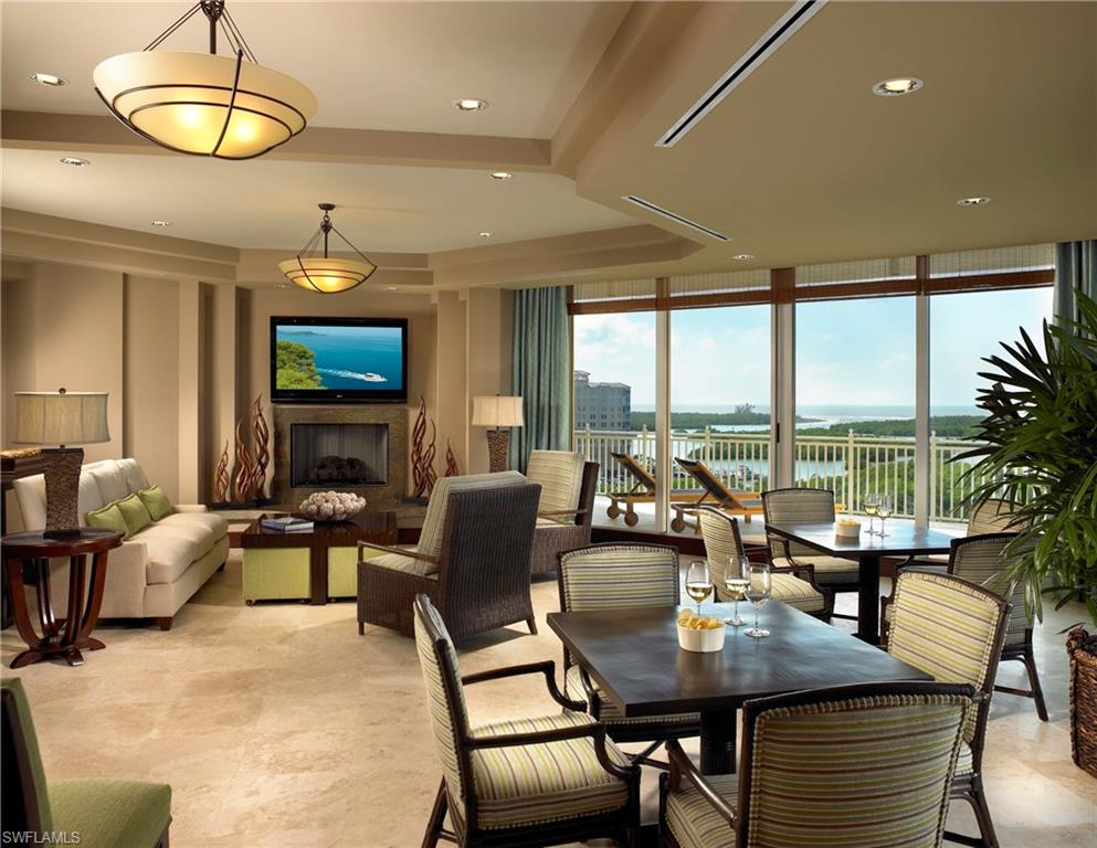 13675 Vanderbilt Drive, Unit 510 Naples, FL 34110 - Photo 18 of 25 a view of a dining room with furniture window and outside view