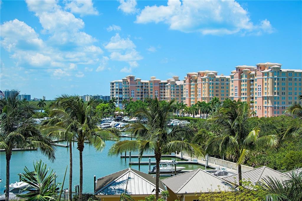13675 Vanderbilt Drive, Unit 510 Naples, FL 34110 - Photo 2 of 25 a view of a city