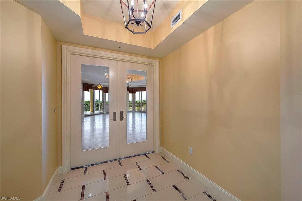 13675 Vanderbilt Drive, Unit 510 Naples, FL 34110 - Photo 3 of 25 a view of entryway with front door