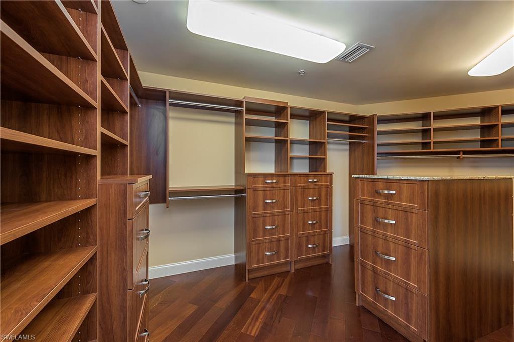 13675 Vanderbilt Drive, Unit 510 Naples, FL 34110 - Photo 10 of 25 a view of an empty walk in closet