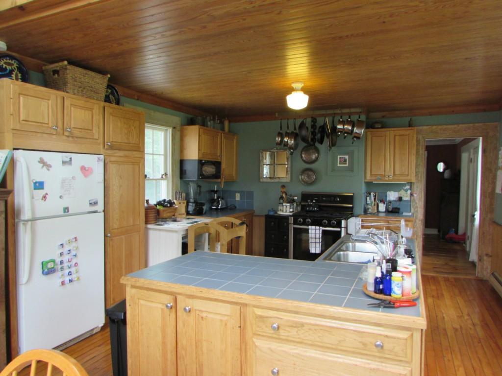 141 Southern Bay Road Penobscot, ME 04476 - Photo 6 of 31 Looking from the kitchen to formal...