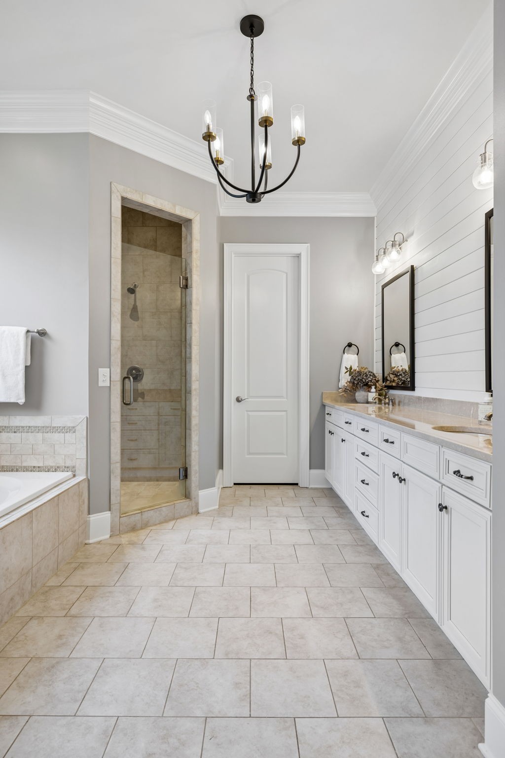 8024 Keats Street Franklin, TN 37064 - Photo 21 of 42 a spacious bathroom with a granite countertop sink a mirror and a shower