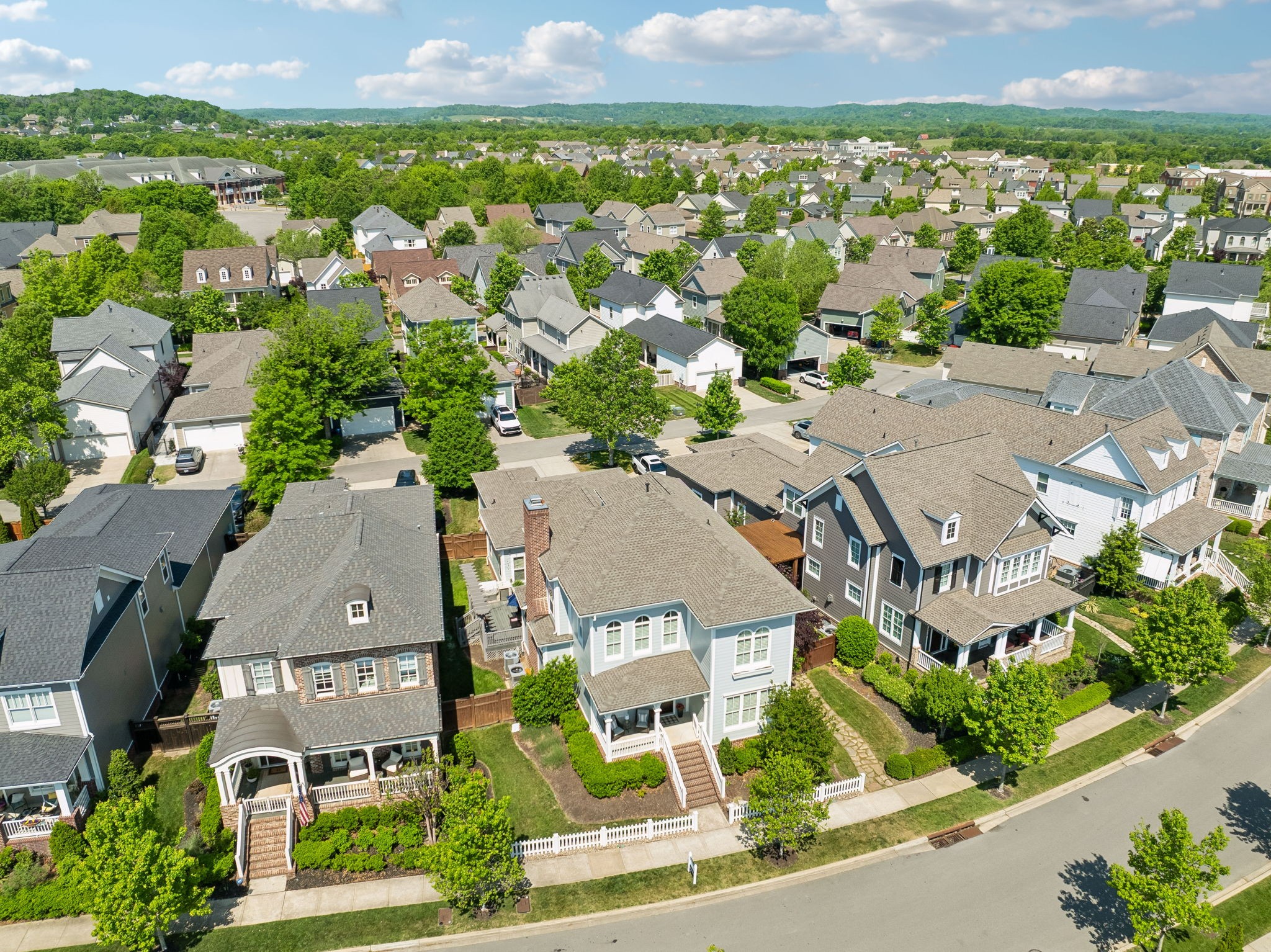 8024 Keats Street Franklin, TN 37064 - Photo 37 of 42 an aerial view of residential houses with outdoor space and street view
