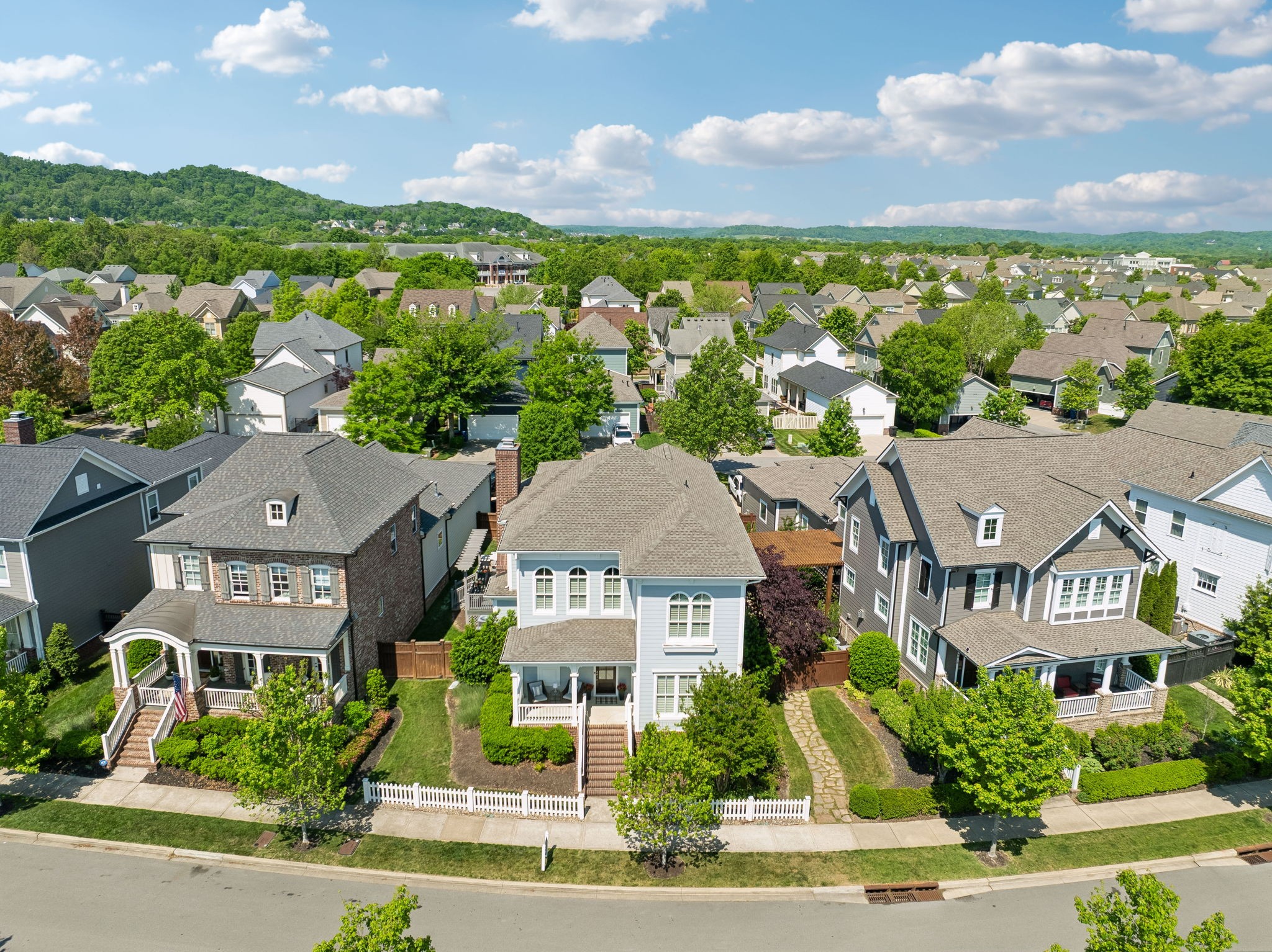 8024 Keats Street Franklin, TN 37064 - Photo 38 of 42 an aerial view of multiple houses with a big yard