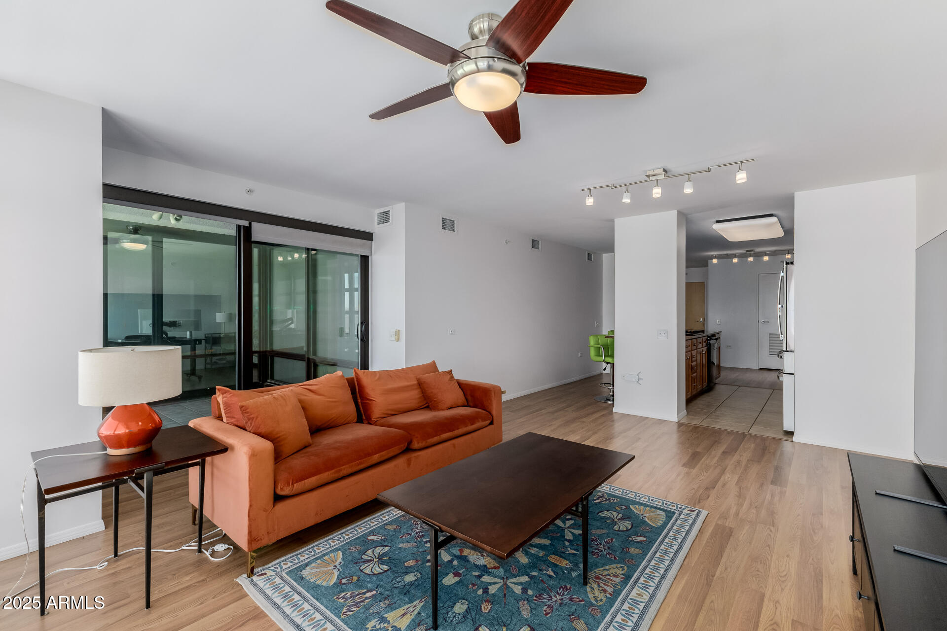 4808 North 24th Street, Unit 1125 Phoenix, AZ 85016 - Photo 13 of 67 a living room with furniture and a large window