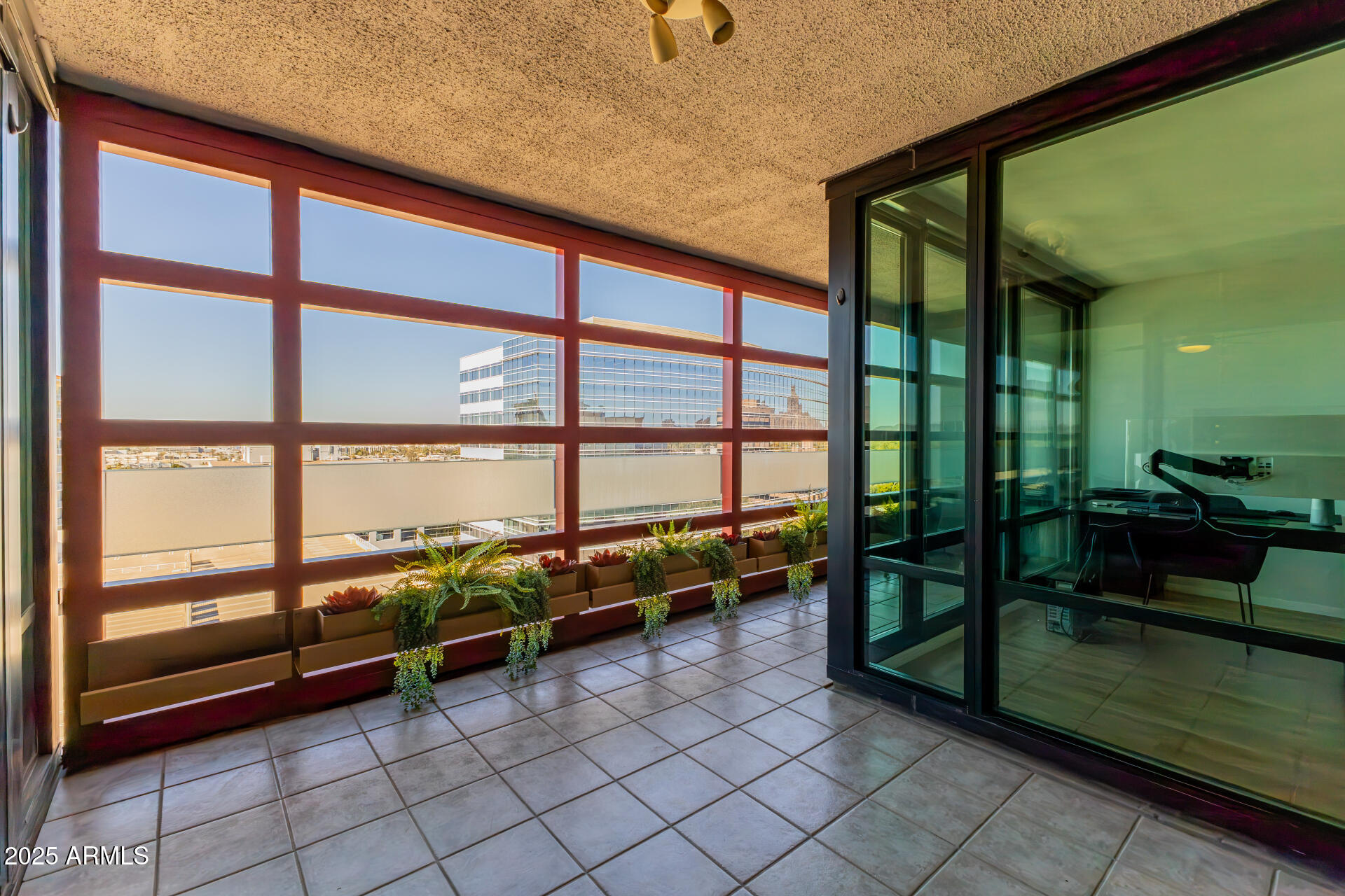 4808 North 24th Street, Unit 1125 Phoenix, AZ 85016 - Photo 18 of 67 a lobby with furniture and outdoor view