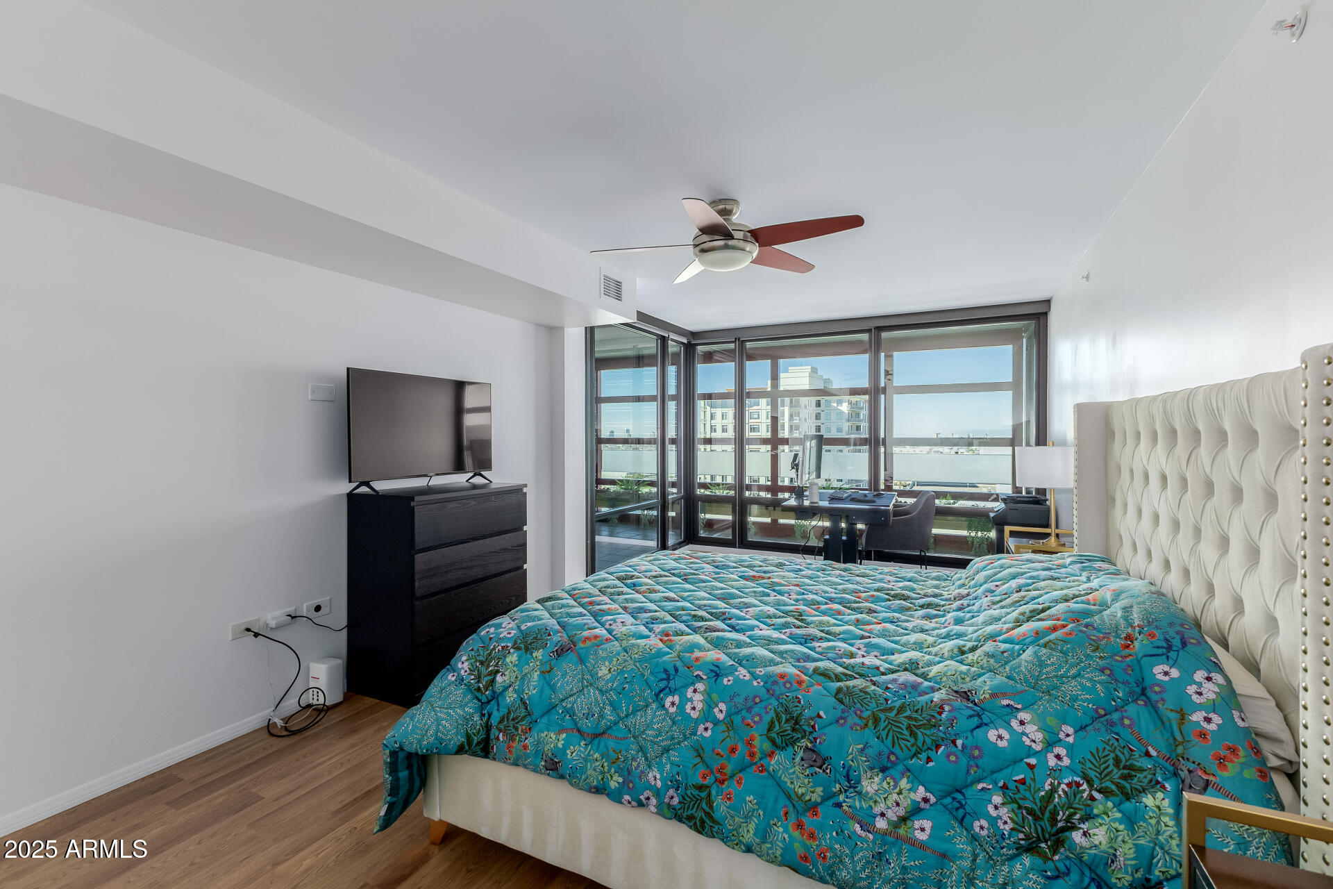 4808 North 24th Street, Unit 1125 Phoenix, AZ 85016 - Photo 20 of 67 a bedroom with a bed and a tv on table