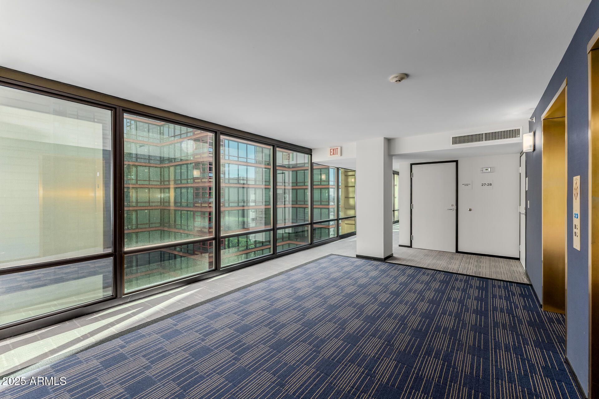 4808 North 24th Street, Unit 1125 Phoenix, AZ 85016 - Photo 23 of 67 a view of empty room with wooden floor