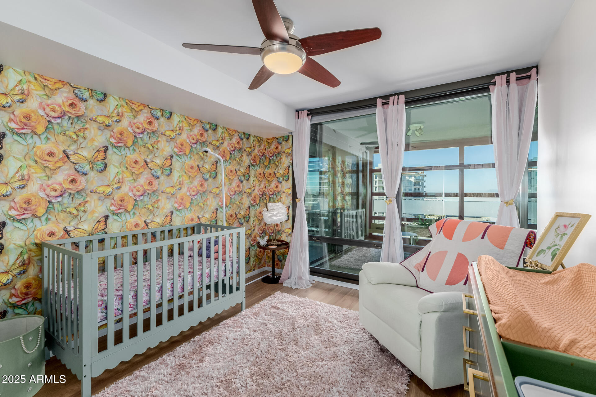 4808 North 24th Street, Unit 1125 Phoenix, AZ 85016 - Photo 30 of 67 a bedroom with furniture and a large window