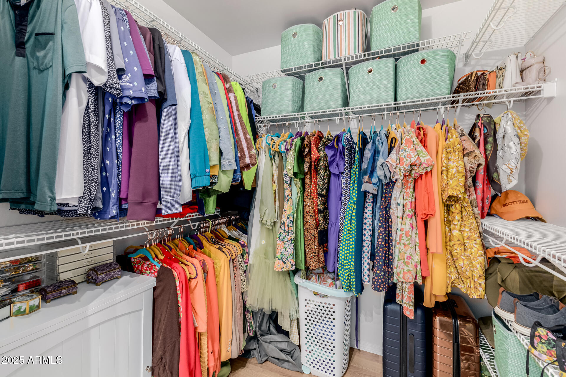 4808 North 24th Street, Unit 1125 Phoenix, AZ 85016 - Photo 32 of 67 a view of walk in closet with clothes