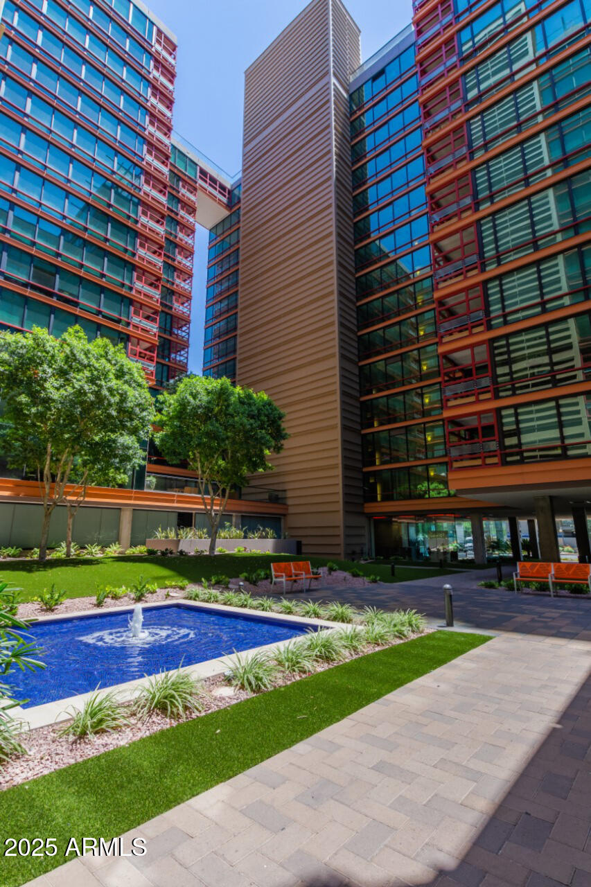 4808 North 24th Street, Unit 1125 Phoenix, AZ 85016 - Photo 45 of 67 a front view of a building with a yard