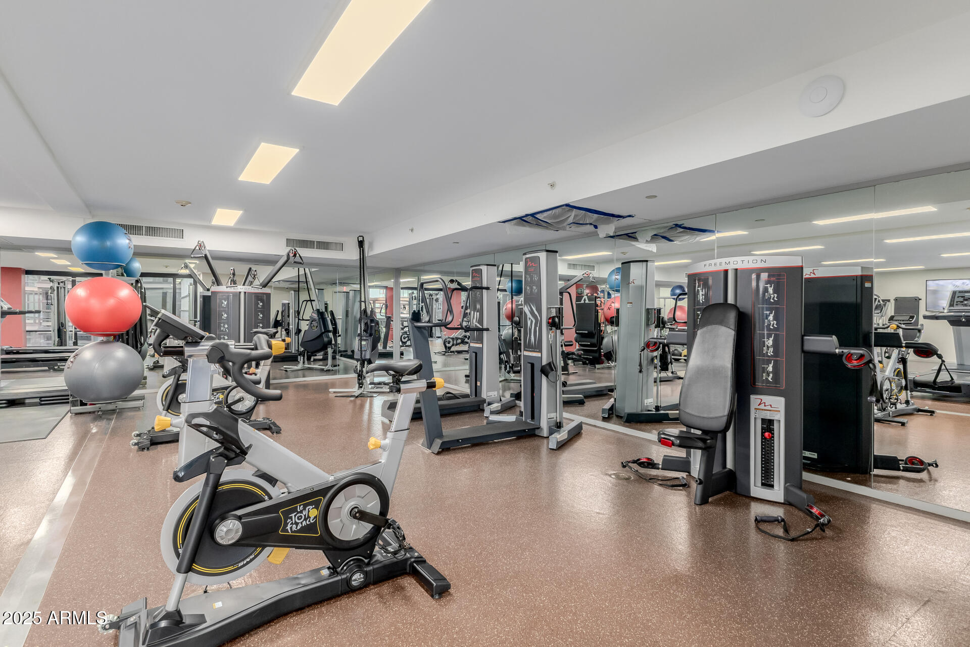 4808 North 24th Street, Unit 1125 Phoenix, AZ 85016 - Photo 51 of 67 a view of a room with gym equipment