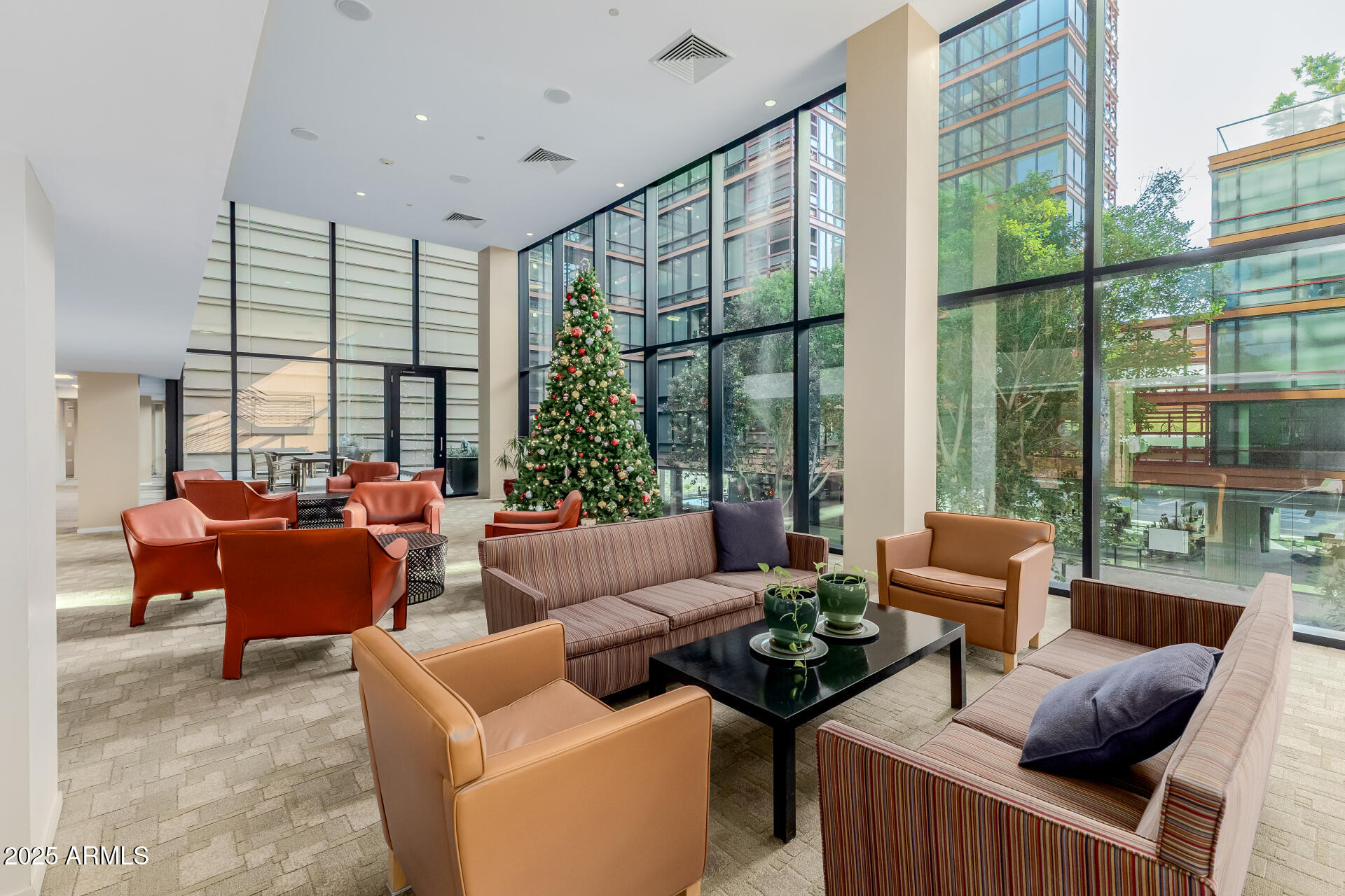 4808 North 24th Street, Unit 1125 Phoenix, AZ 85016 - Photo 55 of 67 a living room with furniture and a large window