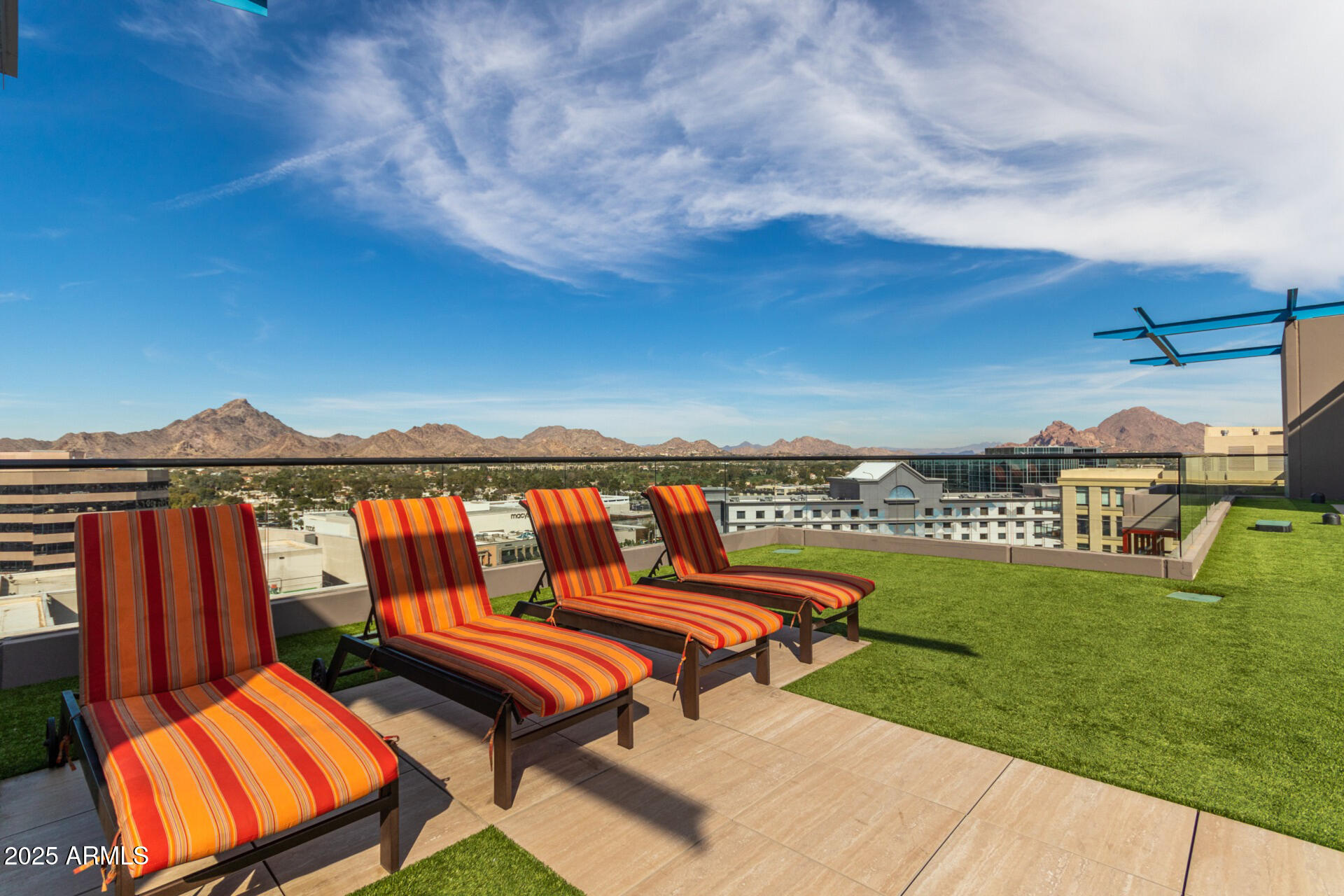 4808 North 24th Street, Unit 1125 Phoenix, AZ 85016 - Photo 60 of 67 a bench sitting in a yard next to a yard