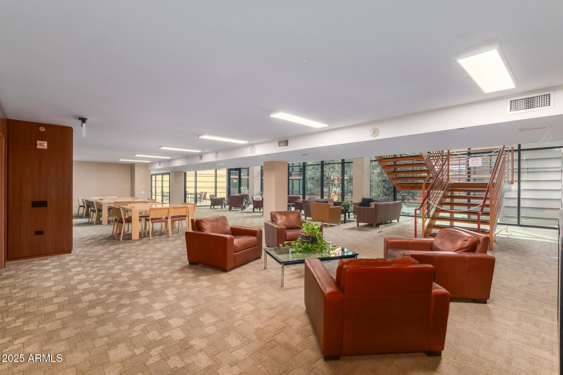 4808 North 24th Street, Unit 1125 Phoenix, AZ 85016 - Photo 63 of 67 a living room with fireplace furniture and floor to ceiling window