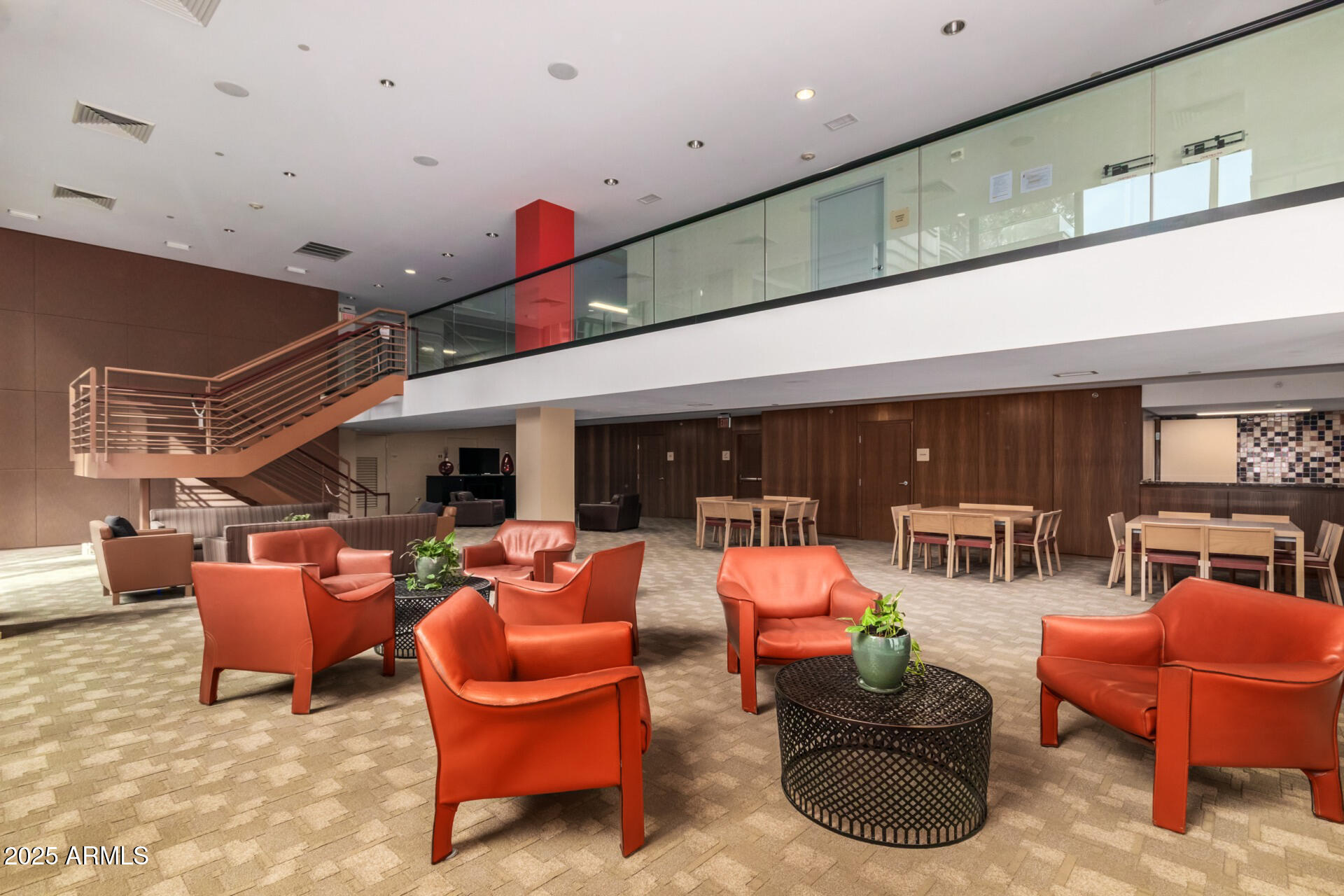 4808 North 24th Street, Unit 1125 Phoenix, AZ 85016 - Photo 64 of 67 a living room with furniture a fireplace and potted plants