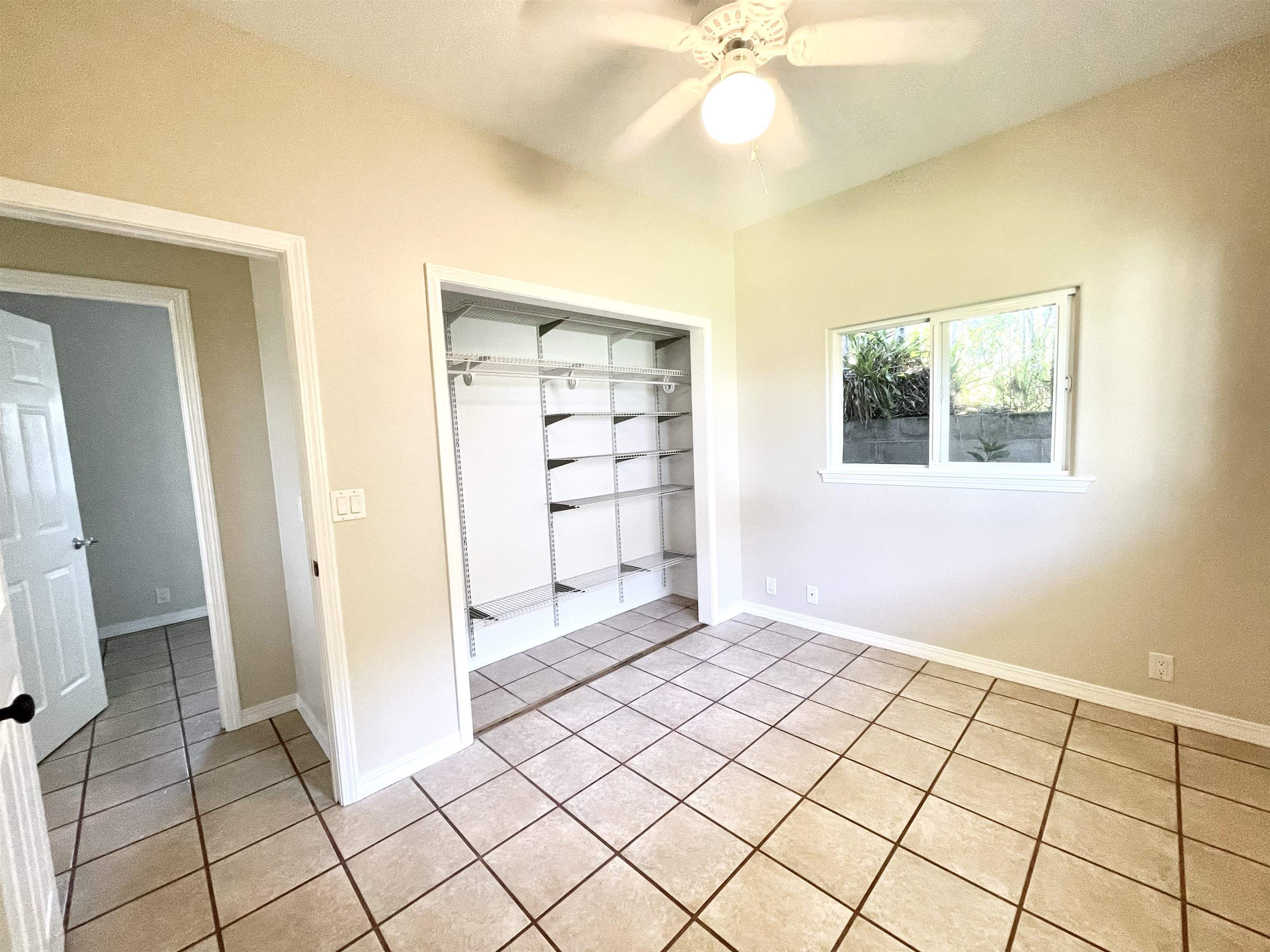 22 Hale Lio Place Haiku, HI 96708 - Photo 36 of 50 a view of an empty room with cabinet and a window
