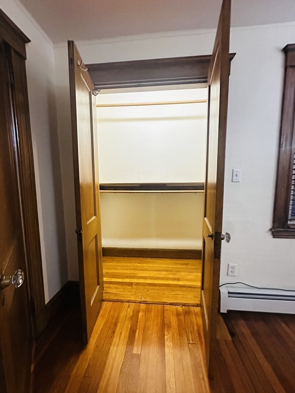 21 Prescott Street, Unit 1 Winthrop, MA 02152 - Photo 13 of 20 a view of an empty room with a window