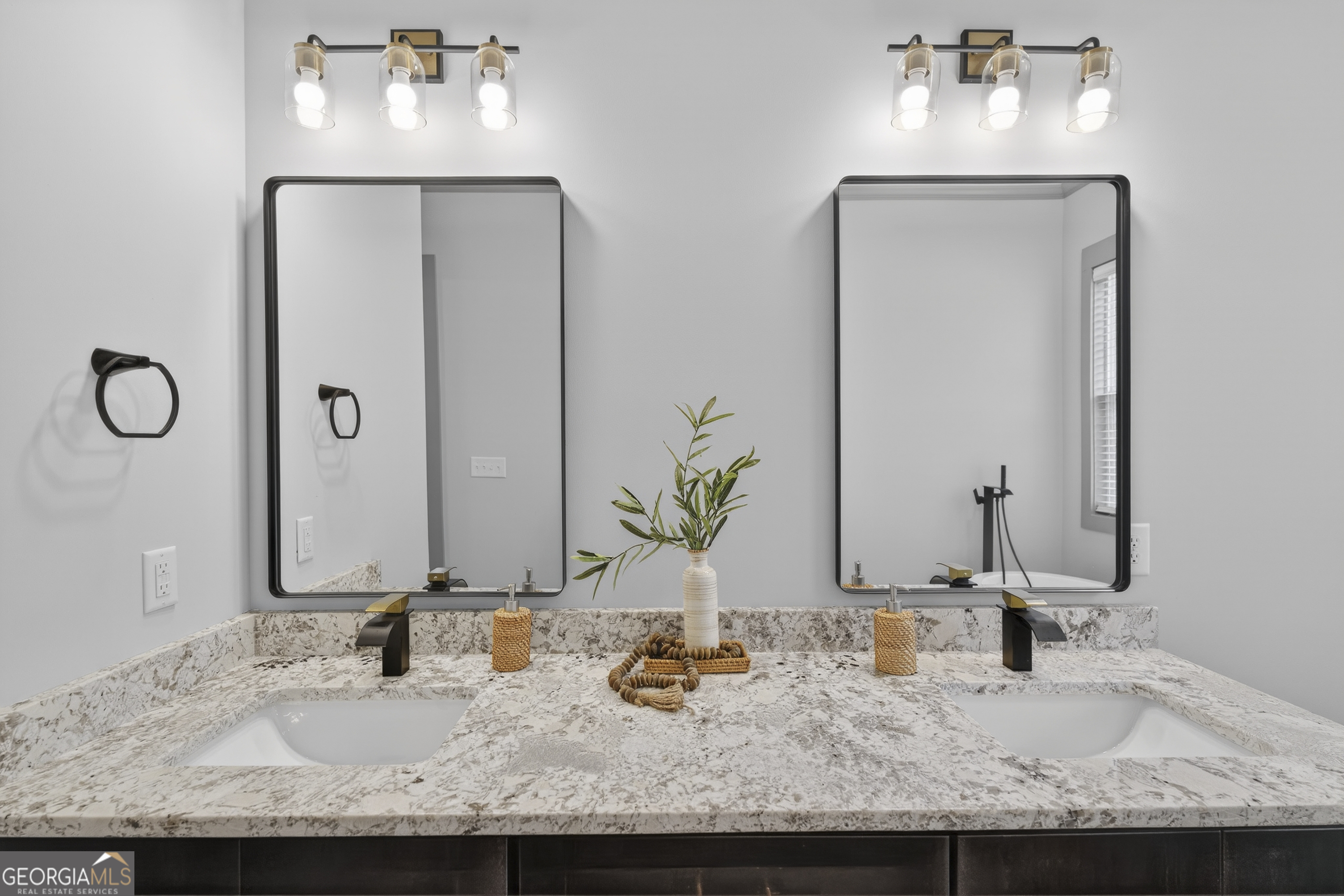 303 Tumbling Shoals Court Gray, GA 31032 - Photo 43 of 86 a bathroom with a granite countertop sink and a mirror