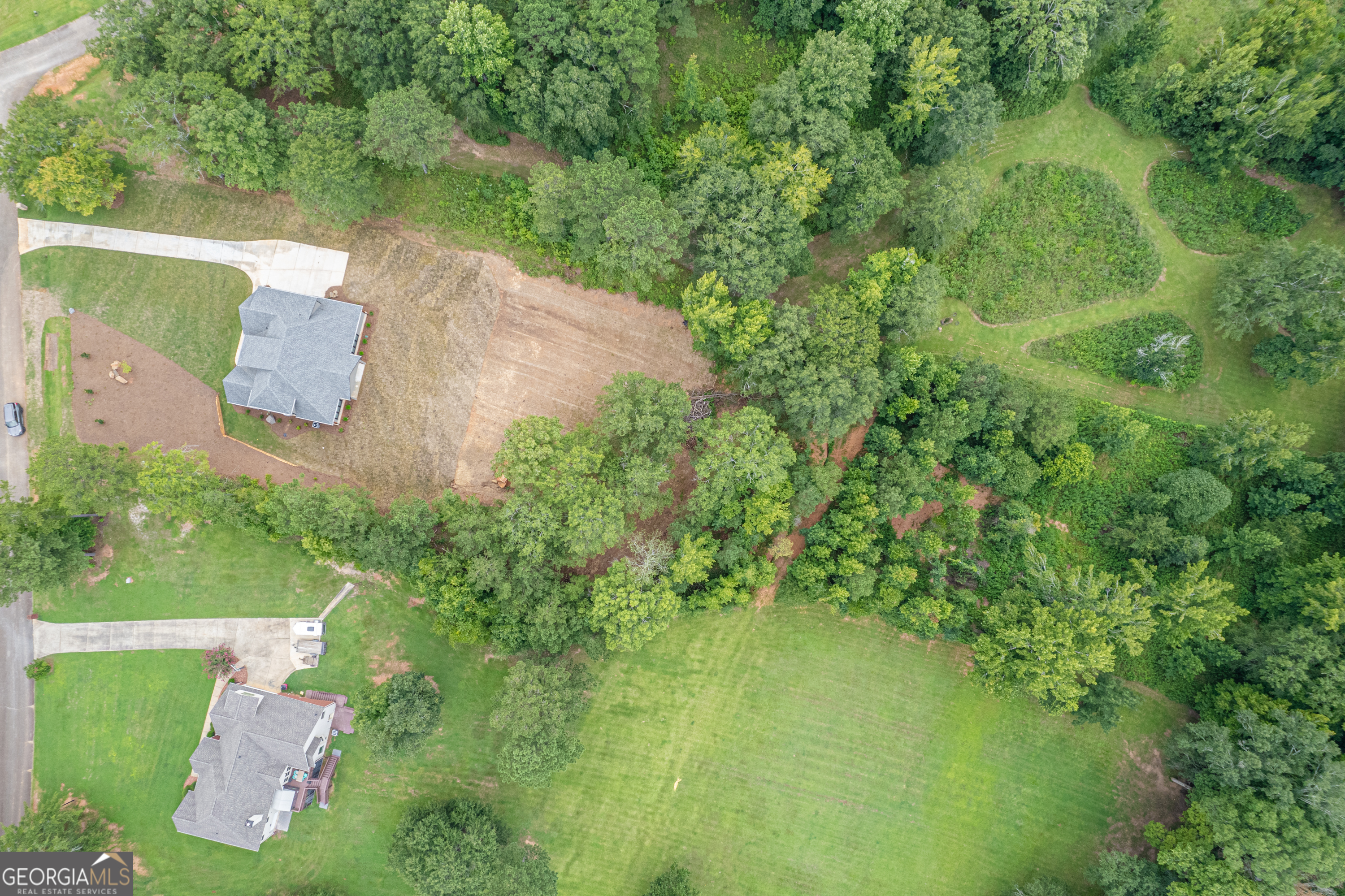 303 Tumbling Shoals Court Gray, GA 31032 - Photo 74 of 86 an aerial view of a house with a yard