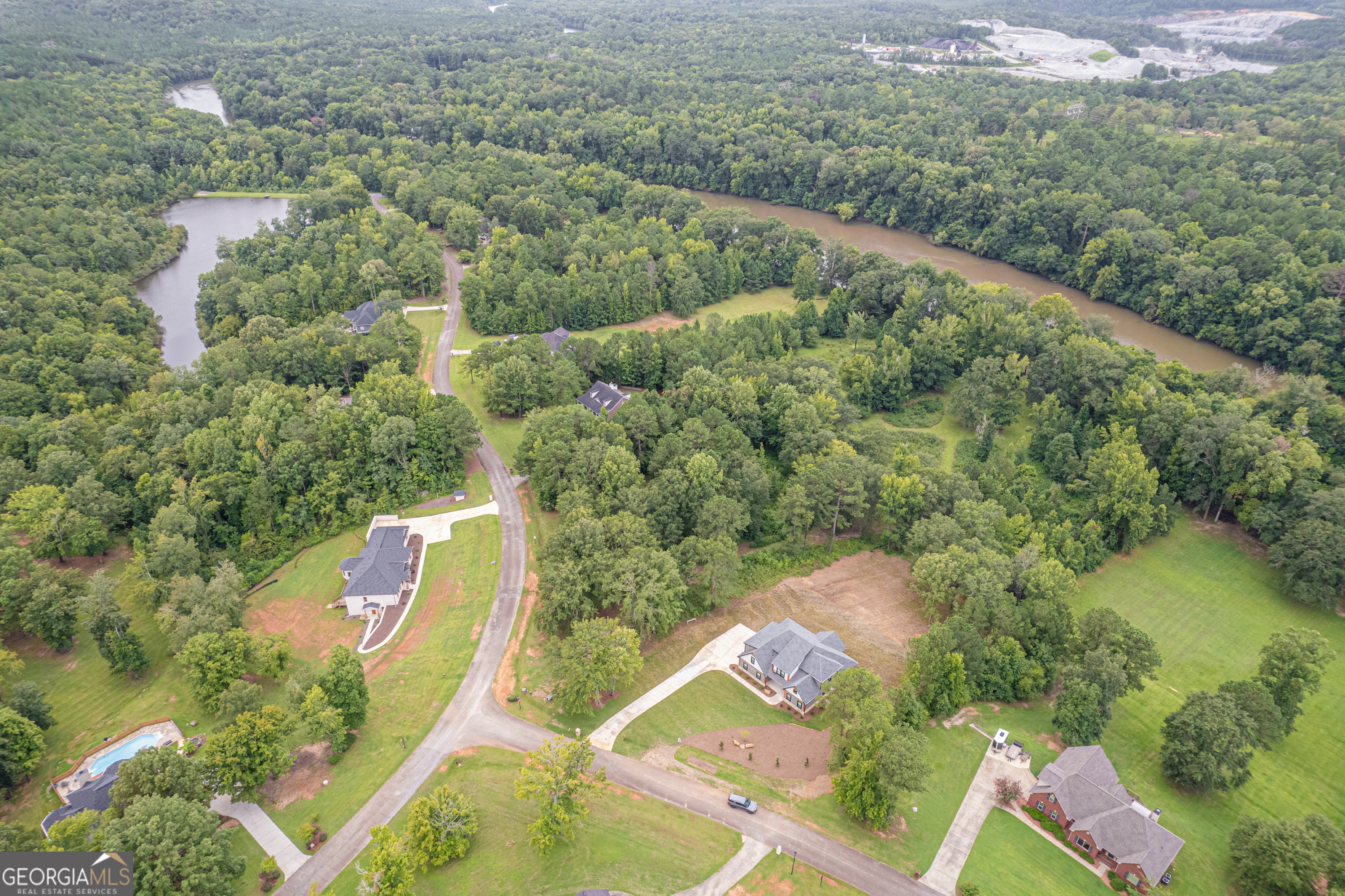 303 Tumbling Shoals Court Gray, GA 31032 - Photo 80 of 86 an aerial view of house with yard swimming pool and outdoor seating