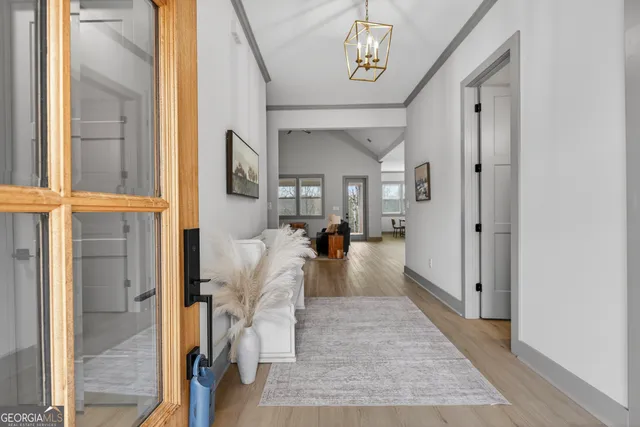 a bathroom with a granite countertop toilet a sink and a bathtub