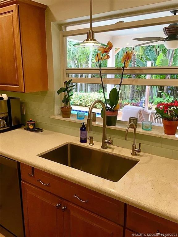 15 Miramar Road Stuart, FL 34996 - Photo 13 of 41 a kitchen with a sink and large window