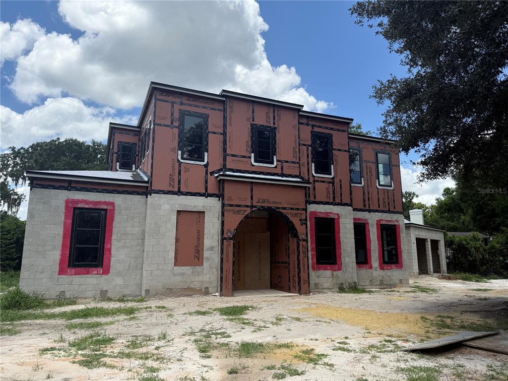 185 Sylvan Boulevard Winter Park, FL 32789 - Photo 9 of 10 a front view of a house with a yard
