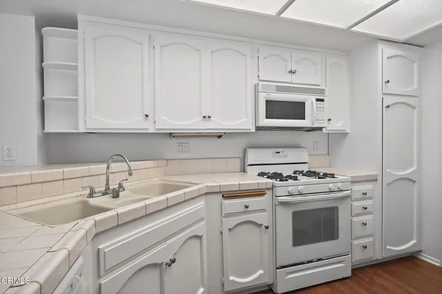 an aerial view of a house with a garden