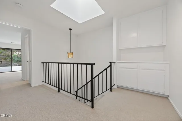 a white bath tub sitting next to a bathroom sink
