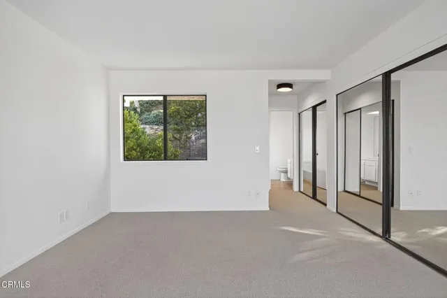 an aerial view of roof deck with seating space