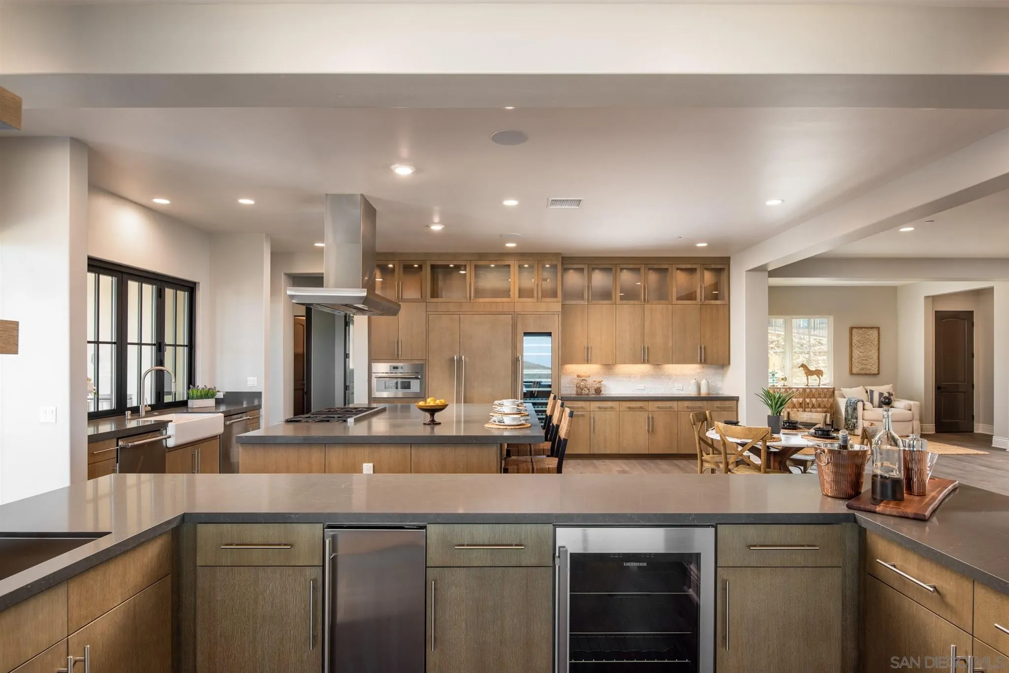 3992 Rancho Summit Drive Encinitas, CA 92024 - Photo 14 of 32 a kitchen with a sink and a large window