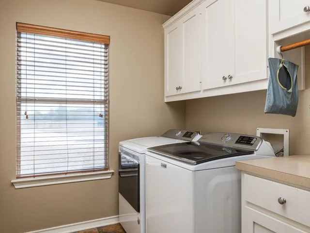 a kitchen with a stove and a sink