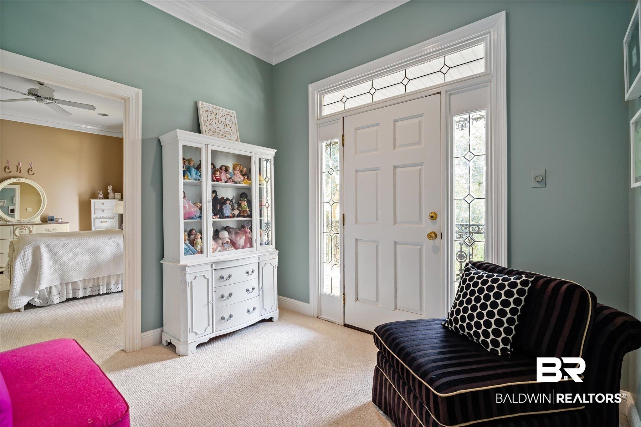 4930 River Trace Theodore, AL 36582 - Photo 27 of 57 Living area featuring ceiling fan, ornamental molding, and light colored carpet