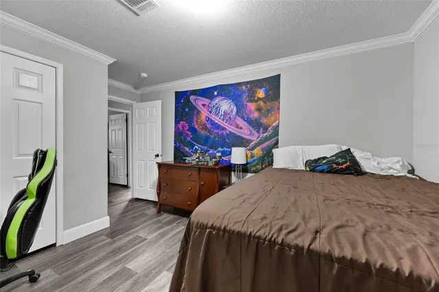 a bathroom with a double vanity sink toilet and a mirror