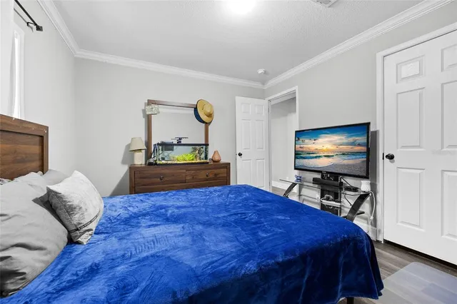 a view of a storage & utility room with a washer dryer