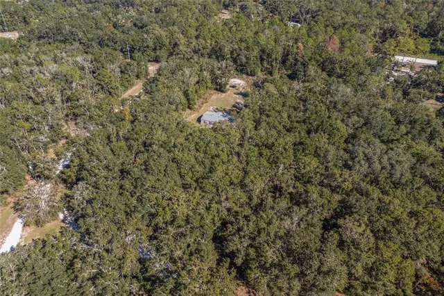 a view of a house with a street