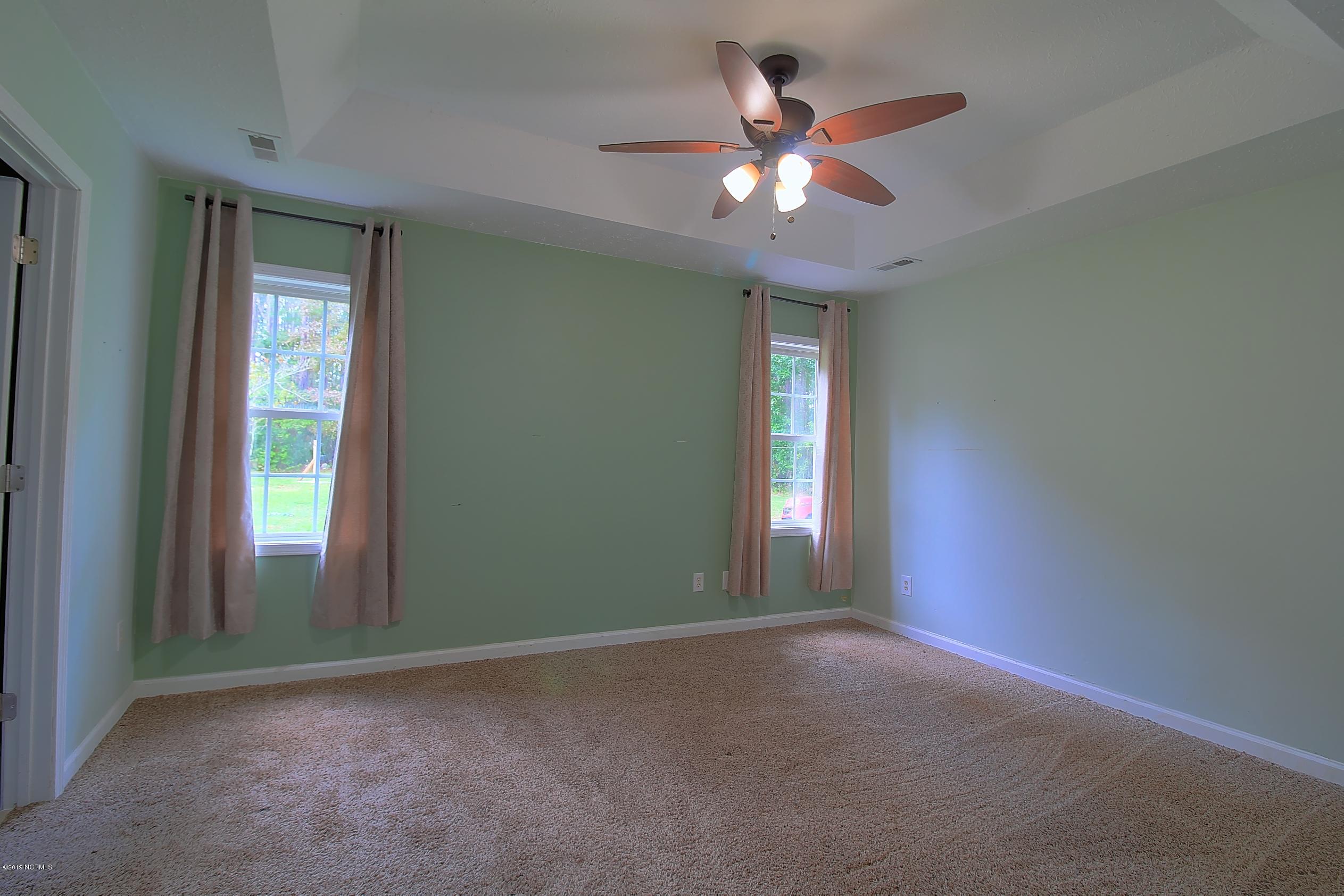 99 Boundary Loop Road Northwest Calabash, NC 28467 - Photo 10 of 15 master bedroom 3