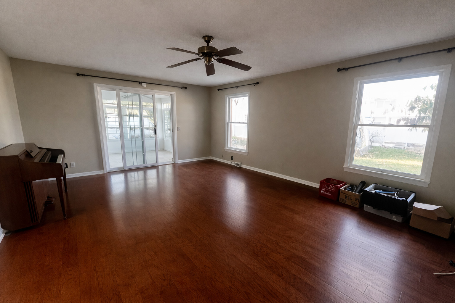 209 Baker Street Metropolis, IL 62960 - Photo 19 of 43 a view of a room with wooden floor and windows