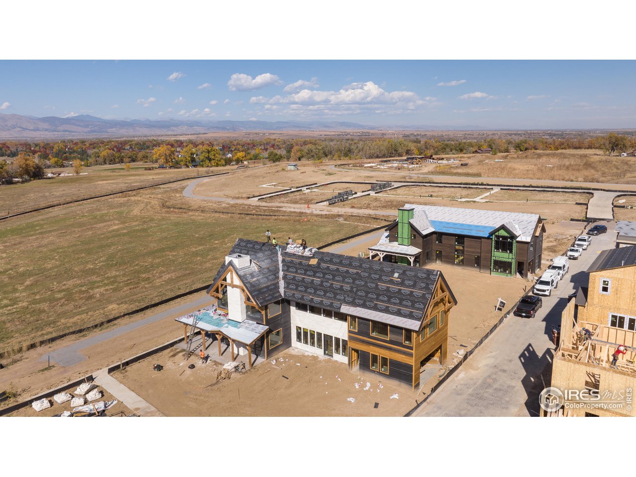 909 Latigo Loop Lafayette, CO 80026 - Photo 11 of 16 a picture of a building with an ocean view and mountain view